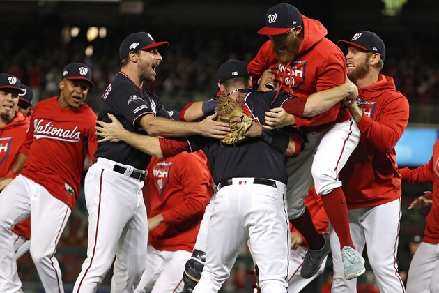 WASHINGTON, DC - OCTOBER 15: The Washington Nationals celebrate winning game four of the National League Championship Series at Nationals Park on October 15, 2019 in Washington, DC. (Photo by Patrick Smith/Getty Images)