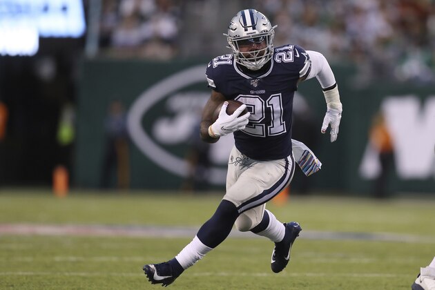 Dallas Cowboys running back Ezekiel Elliott (21) runs up the field with the ball during the second half of an NFL football game against the New York Jets, Sunday, Oct. 13, 2019, in East Rutherford, N.J. (AP Photo/Steve Luciano)