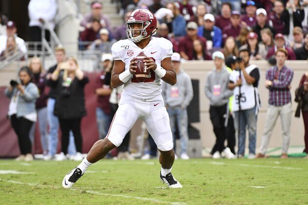 COLLEGE STATION, TEXAS - OCTOBER 12: Quarterback Tua Tagovailoa #13 of the Alabama Crimson Tide looks for a pass during the game against Texas A&M Aggies at Kyle Field on October 12, 2019 in College Station, Texas. (Photo by Logan Riely/Getty Images)