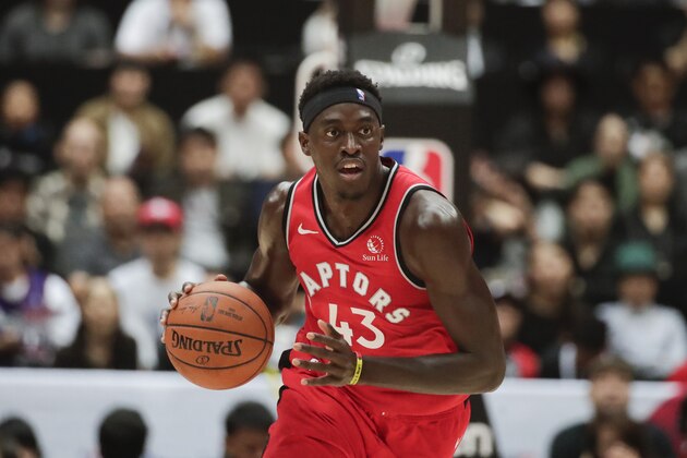 Toronto Raptors' Pascal Siakam dribbles the ball during the first half of an NBA preseason basketball game against the Houston Rockets Tuesday, Oct. 8, 2019, in Saitama, near Tokyo. (AP Photo/Jae C. Hong)