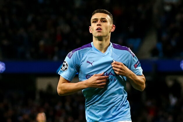 MANCHESTER, ENGLAND - OCTOBER 01: Phil Foden of Manchester City celebrates after scoring a goal to make it 2-0 during the UEFA Champions League group C match between Manchester City and Dinamo Zagreb at Etihad Stadium on October 1, 2019 in Manchester, United Kingdom. (Photo by Robbie Jay Barratt - AMA/Getty Images)