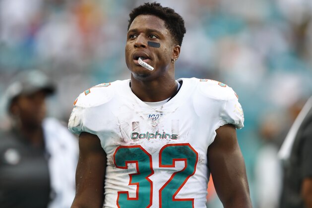 Miami Dolphins running back Kenyan Drake (32) walks the sidelines, during the second half at an NFL football game against the Washington Redskins, Sunday, Oct. 13, 2019, in Miami Gardens, Fla. (AP Photo/Brynn Anderson) Miami Dolphins running back Kenyan Drake (32) walks the sidelines, during the second half at an NFL football game against the Washington Redskins, Sunday, Oct. 13, 2019, in Miami Gardens, Fla. (AP Photo/Brynn Anderson)