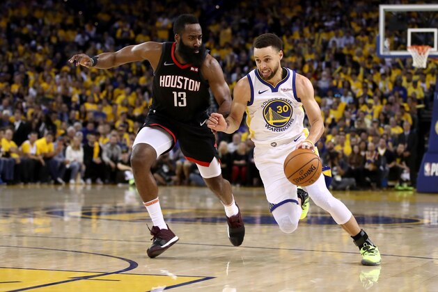 OAKLAND, CALIFORNIA - MAY 08:   James Harden #13 of the Houston Rockets guards Stephen Curry #30 of the Golden State Warriors during Game Five of the Western Conference Semifinals of the 2019 NBA Playoffs at ORACLE Arena on May 08, 2019 in Oakland, California.  NOTE TO USER: User expressly acknowledges and agrees that, by downloading and or using this photograph, User is consenting to the terms and conditions of the Getty Images License Agreement.  (Photo by Ezra Shaw/Getty Images)