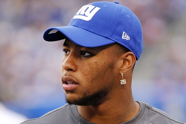 EAST RUTHERFORD, NEW JERSEY - OCTOBER 06:  (NEW YORK DAILIES OUT)  Saquon Barkley #26 of the New York Giants looks on during a game against the Minnesota Vikings at MetLife Stadium on October 06, 2019 in East Rutherford, New Jersey. The Vikings defeated the Giants 28-10.  (Photo by Jim McIsaac/Getty Images)