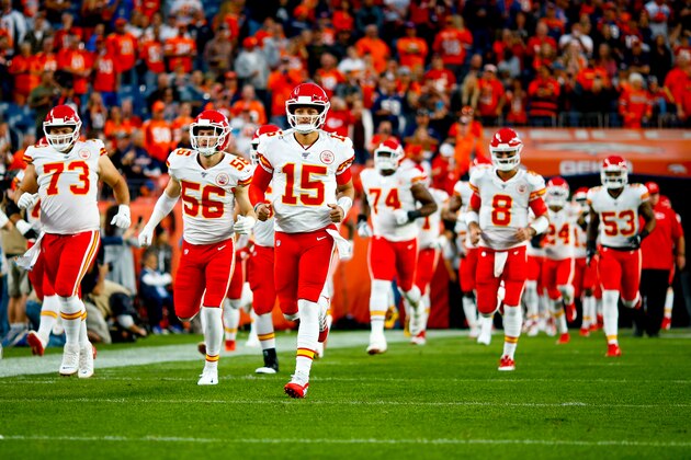 DENVER, CO - OCTOBER 17:  Quarterback Patrick Mahomes #15 of the Kansas City Chiefs leads his team onto the field before a game against the Denver Broncos at Empower Field at Mile High on October 17, 2019 in Denver, Colorado. (Photo by Justin Edmonds/Getty Images)