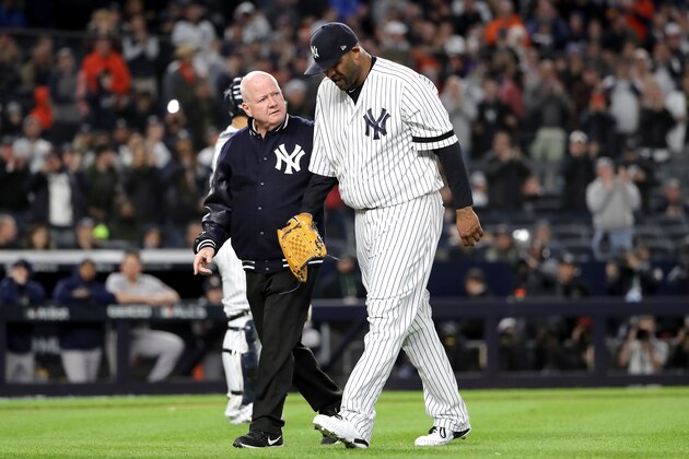 NEW YORK, NEW YORK - OCTOBER 17:  CC Sabathia #52 of the New York Yankees walks off the field as he comes out of the game against the Houston Astros during the eighth inning in game four of the American League Championship Series at Yankee Stadium on October 17, 2019 in New York City. (Photo by Elsa/Getty Images)