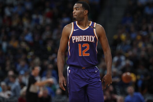 Phoenix Suns forward TJ Warren (12) in the second half of an NBA basketball game Wednesday, Jan. 3, 2018, in Denver. The Nuggets won 134-111. (AP Photo/David Zalubowski)