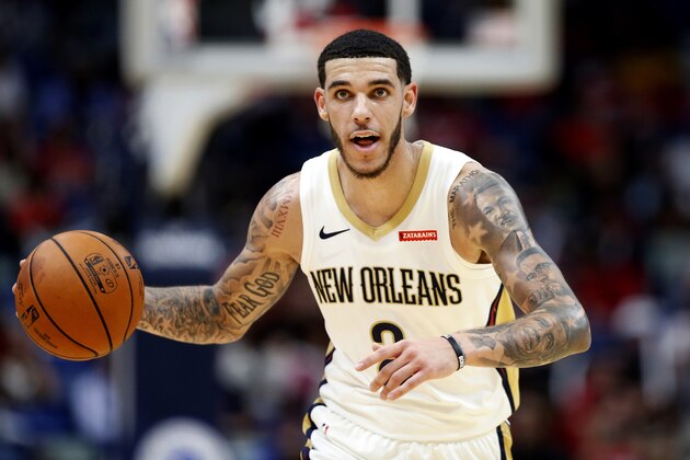 New Orleans Pelicans guard Lonzo Ball (2) in the first half of a preseason NBA basketball game against the Utah Jazz in New Orleans, Friday, Oct. 11, 2019. (AP Photo/Tyler Kaufman)