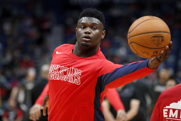 New Orleans Pelicans forward Zion Williamson (1) warms up before a preseason NBA basketball game against the Utah Jazz in New Orleans, Friday, Oct. 11, 2019. (AP Photo/Tyler Kaufman)