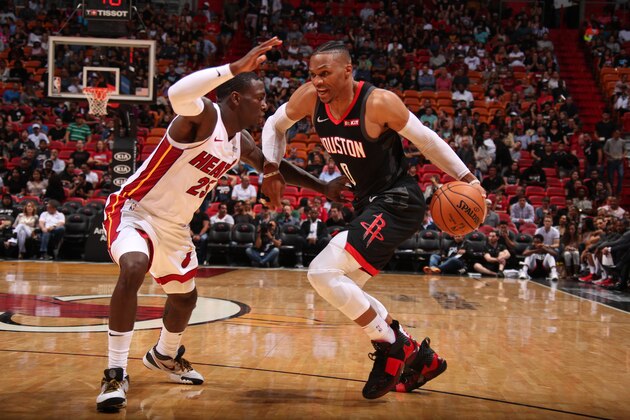 MIAMI, FL - OCTOBER 18: Russell Westbrook #0 of the Houston Rockets handles the ball against the Miami Heat during a pre-season game on October 18, 2019 at American Airlines Arena in Miami, Florida. NOTE TO USER: User expressly acknowledges and agrees that, by downloading and or using this Photograph, user is consenting to the terms and conditions of the Getty Images License Agreement. Mandatory Copyright Notice: Copyright 2019 NBAE (Photo by Issac Baldizon/NBAE via Getty Images)