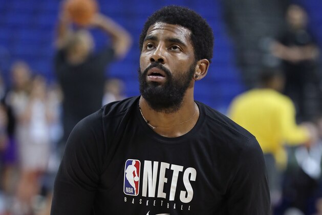 SHANGHAI, CHINA - OCTOBER 10: Kyrie Irving #11 of the Brooklyn Nets warms up before a preseason game against the Los Angeles Lakers as part of 2019 NBA Global Games China on October 10, 2019 at Mercedes Benz Arena in Shanghai, China. NOTE TO USER: User expressly acknowledges and agrees that, by downloading and/or using this Photograph, user is consenting to the terms and conditions of the Getty Images License Agreement. Mandatory Copyright Notice: Copyright 2019 NBAE (Photo by Nathaniel S. Butler/NBAE via Getty Images)