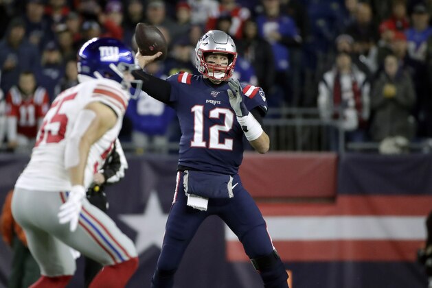New England Patriots quarterback Tom Brady throws his first pass of the game against the New York Giants in the first half of an NFL football game, Thursday, Oct. 10, 2019, in Foxborough, Mass. The completion gave Brady the second most total passing yards in NFL history. (AP Photo/Elise Amendola)