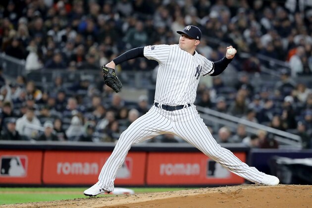 NEW YORK, NEW YORK - OCTOBER 18: Zack Britton #53 of the New York Yankees throws a pitch against the Houston Astros during the seventh inning in game five of the American League Championship Series at Yankee Stadium on October 18, 2019 in New York City. (Photo by Elsa/Getty Images)