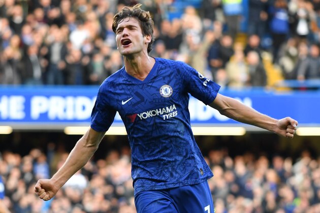 Chelsea's Spanish defender Marcos Alonso celebrates after scoring the opening goal of the English Premier League football match between Chelsea and Newcastle at Stamford Bridge in London on October 19, 2019. (Photo by Oliver GREENWOOD / AFP) / RESTRICTED TO EDITORIAL USE. No use with unauthorized audio, video, data, fixture lists, club/league logos or 'live' services. Online in-match use limited to 120 images. An additional 40 images may be used in extra time. No video emulation. Social media in-match use limited to 120 images. An additional 40 images may be used in extra time. No use in betting publications, games or single club/league/player publications. /  (Photo by OLIVER GREENWOOD/AFP via Getty Images)