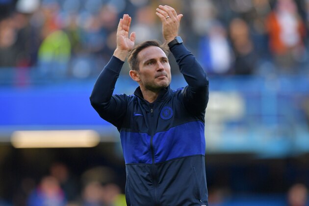 Chelsea's English head coach Frank Lampard applauds supporters on the pitch after the English Premier League football match between Chelsea and Newcastle at Stamford Bridge in London on October 19, 2019. - Chelsea won the game 1-0. (Photo by Oliver GREENWOOD / AFP) / RESTRICTED TO EDITORIAL USE. No use with unauthorized audio, video, data, fixture lists, club/league logos or 'live' services. Online in-match use limited to 120 images. An additional 40 images may be used in extra time. No video emulation. Social media in-match use limited to 120 images. An additional 40 images may be used in extra time. No use in betting publications, games or single club/league/player publications. /  (Photo by OLIVER GREENWOOD/AFP via Getty Images)