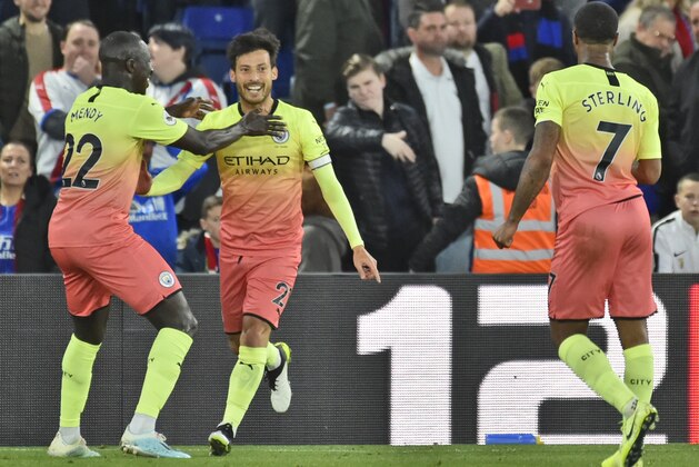 Manchester City's David Silva celebrates after scoring his side second goal during the English Premier League soccer match between Crystal Palace and Manchester City at Selhurst Park in London, England, Saturday, Oct. 19, 2019. (AP Photo/Rui Vieira)