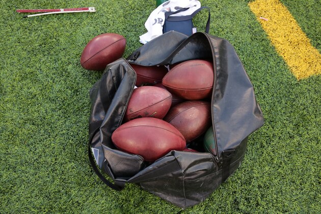 Footballs sit in a bag on the sideline during the second half of an NFL football game between the Seattle Seahawks and the New York Giants, Sunday, Dec. 15, 2013, in East Rutherford, N.J. (AP Photo/Peter Morgan)