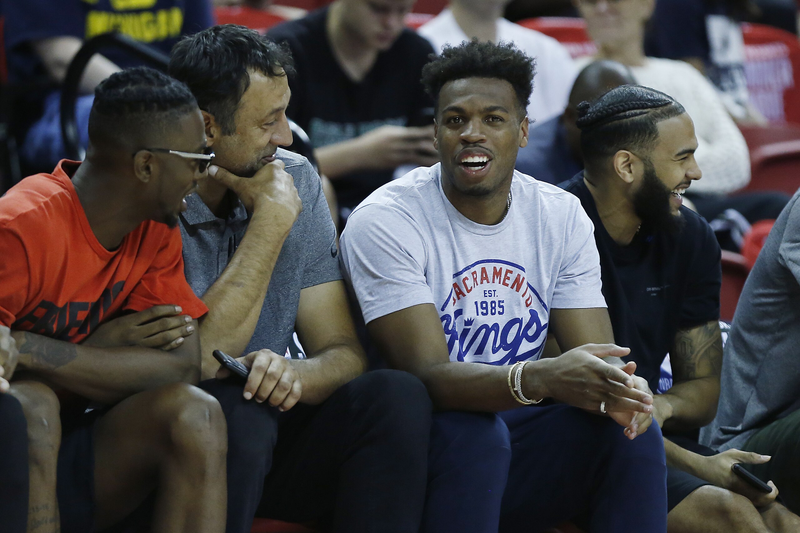 LAS VEGAS, NEVADA - JULY 08:  Harry Giles #20, general manager Vlade Divac and Buddy Hield #24 of the Sacramento Kings look on against the Dallas Mavericks during the 2019 Summer League at the Thomas & Mack Center on July 08, 2019 in Las Vegas, Nevada. NOTE TO USER: User expressly acknowledges and agrees that, by downloading and or using this photograph, User is consenting to the terms and conditions of the Getty Images License Agreement. (Photo by Michael Reaves/Getty Images)
