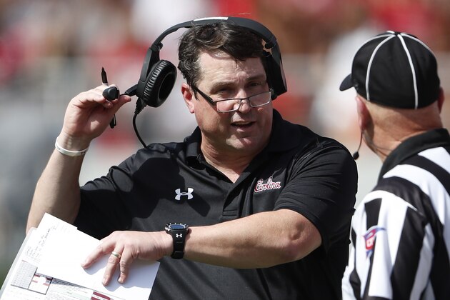 South Carolina head coach Will Muschamp talks to an official in the first half of an NCAA college football game against Georgia Saturday, Oct. 12, 2019, in Athens, Ga. (AP Photo/John Bazemore)