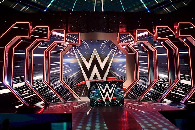 LAS VEGAS, NEVADA - OCTOBER 11:  WWE logos are shown on screens before a WWE news conference at T-Mobile Arena on October 11, 2019 in Las Vegas, Nevada. It was announced that WWE wrestler Braun Strowman will face heavyweight boxer Tyson Fury and WWE champion Brock Lesnar will take on former UFC heavyweight champion Cain Velasquez at the WWE's Crown Jewel event at Fahd International Stadium in Riyadh, Saudi Arabia on October 31.  (Photo by Ethan Miller/Getty Images)