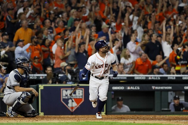 Houston Astros' Jose Altuve watches his two-run walk-off to win Game 6 of baseball's American League Championship Series against the New York Yankees Saturday, Oct. 19, 2019, in Houston. The Astros won 6-4 to win the series 4-2. (AP Photo/Matt Slocum)
