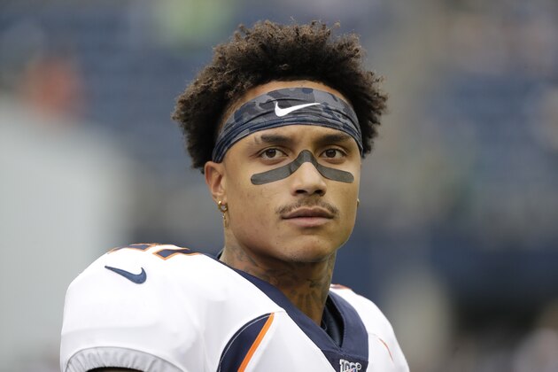 Denver Broncos defensive back Su'a Cravens on the field before an NFL football preseason game against the Seattle Seahawks, Thursday, Aug. 8, 2019, in Seattle. (AP Photo/Elaine Thompson)