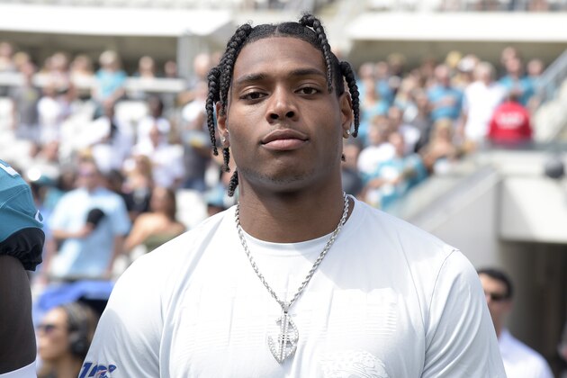 Jacksonville Jaguars cornerback Jalen Ramsey stands on the sideline for the playing of the national anthem before an NFL football game against the New Orleans Saints Sunday, Oct. 13, 2019, in Jacksonville, Fla. (AP Photo/Phelan M. Ebenhack)