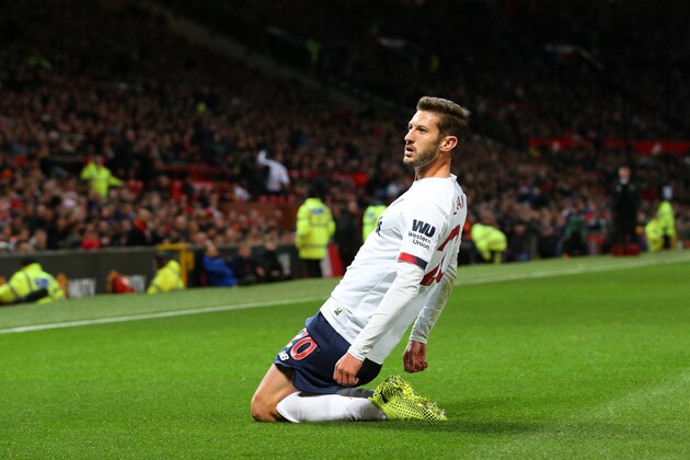 MANCHESTER, ENGLAND - OCTOBER 20: Adam Lallana of Liverpool celebrates after scoring his sides first goal during the Premier League match between Manchester United and Liverpool FC at Old Trafford on October 20, 2019 in Manchester, United Kingdom. (Photo by Alex Livesey/Getty Images)