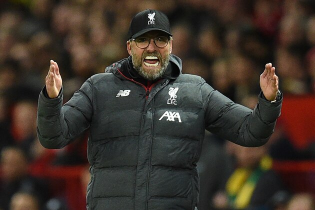Liverpool's German manager Jurgen Klopp gestures on the touchline during the English Premier League football match between Manchester United and Liverpool at Old Trafford in Manchester, north west England, on October 20, 2019. (Photo by Oli SCARFF / AFP) / RESTRICTED TO EDITORIAL USE. No use with unauthorized audio, video, data, fixture lists, club/league logos or 'live' services. Online in-match use limited to 120 images. An additional 40 images may be used in extra time. No video emulation. Social media in-match use limited to 120 images. An additional 40 images may be used in extra time. No use in betting publications, games or single club/league/player publications. /  (Photo by OLI SCARFF/AFP via Getty Images)