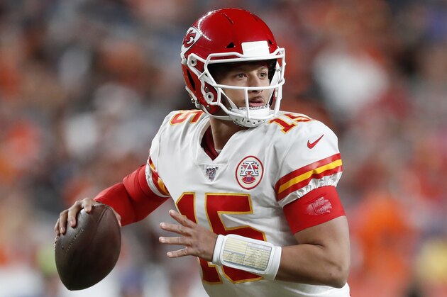 Kansas City Chiefs quarterback Patrick Mahomes (15) throws against the Denver Broncos during the first half of an NFL football game, Thursday, Oct. 17, 2019, in Denver. (AP Photo/David Zalubowski)