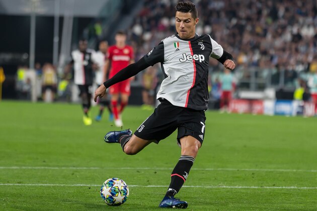 TURIN, ITALY - OCTOBER 01: Christiano Ronaldo of Juventus Turin controls the ball during the UEFA Champions League group D match between Juventus and Bayer Leverkusen at Juventus Arena on October 1, 2019 in Turin, Italy. (Photo by TF-Images/Getty Images)