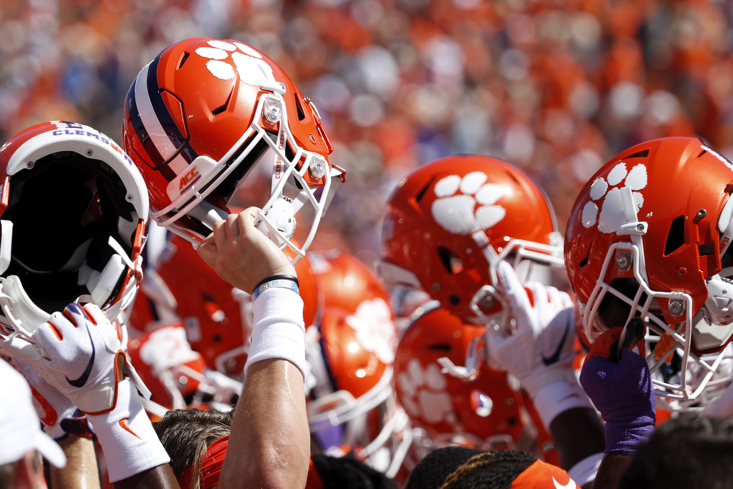 CLEMSON, SC - SEPTEMBER 07: General view as Clemson Tigers players hold up their helmets during a game against the Texas A&M Aggies at Memorial Stadium on September 7, 2019 in Clemson, South Carolina. Clemson defeated Texas A&M 24-10. (Photo by Joe Robbins/Getty Images) CLEMSON, SC - SEPTEMBER 07: General view as Clemson Tigers players hold up their helmets during a game against the Texas A&M Aggies at Memorial Stadium on September 7, 2019 in Clemson, South Carolina. Clemson defeated Texas A&M 24-10. (Photo by Joe Robbins/Getty Images)