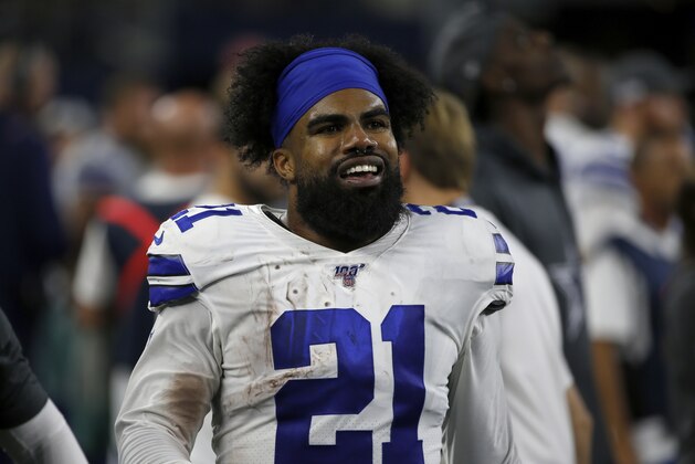 Dallas Cowboys running back Ezekiel Elliott (21) walks along the sideline in the second half of an NFL football game against the Dallas Cowboys in Arlington, Texas, Sunday, Oct. 20, 2019. (AP Photo/Ron Jenkins)