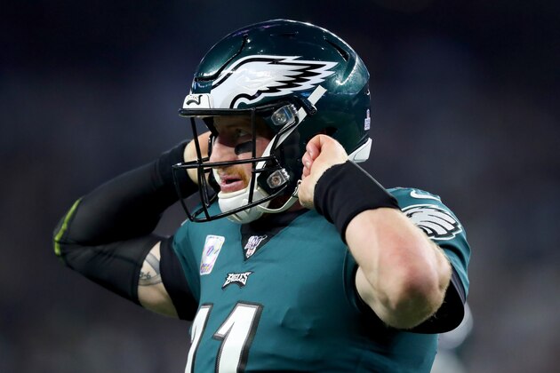 ARLINGTON, TEXAS - OCTOBER 20: Carson Wentz #11 of the Philadelphia Eagles reacts after fumbling the ball against the Dallas Cowboys in the second quarter at AT&T Stadium on October 20, 2019 in Arlington, Texas. (Photo by Tom Pennington/Getty Images)