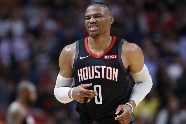 MIAMI, FLORIDA - OCTOBER 18: Russell Westbrook #0 of the Houston Rockets reacts after being injured against the Miami Heat during the second half at American Airlines Arena on October 18, 2019 in Miami, Florida. NOTE TO USER: User expressly acknowledges and agrees that, by downloading and or using this photograph, User is consenting to the terms and conditions of the Getty Images License Agreement. (Photo by Michael Reaves/Getty Images)