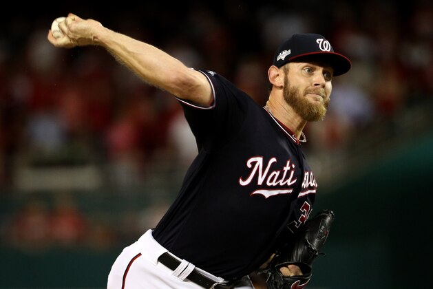 WASHINGTON, DC - OCTOBER 14: Stephen Strasburg #37 of the Washington Nationals delivers in the first inning of game three of the National League Championship Series against the St. Louis Cardinals at Nationals Park on October 14, 2019 in Washington, DC. (Photo by Patrick Smith/Getty Images)