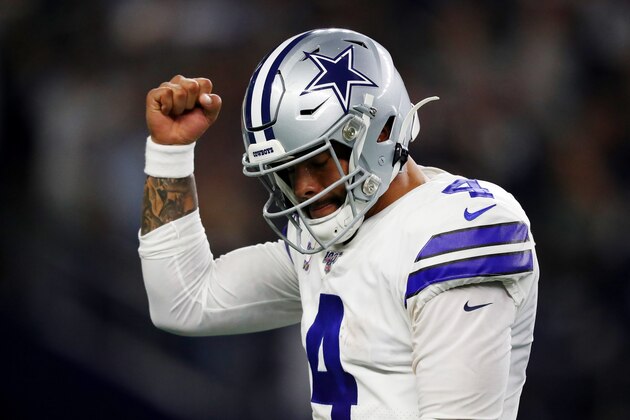 ARLINGTON, TEXAS - OCTOBER 20: Dak Prescott #4 of the Dallas Cowboys celebrates a first quarter touchdown against the Philadelphia Eagles in the game at AT&T Stadium on October 20, 2019 in Arlington, Texas. (Photo by Tom Pennington/Getty Images)