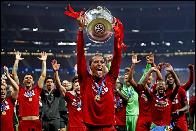 Virgil van Dijk of Liverpool FC lifts the trophy after winning the UEFA Champions League final. during the UEFA Champions League final match between Tottenham Hotspur FC and Liverpool FC at Estadio Metropolitano on June 01, 2019 in Madrid, Spain(Photo by VI Images via Getty Images)