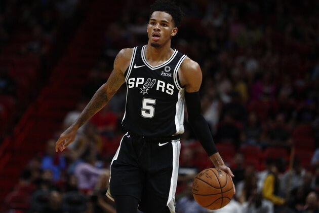 San Antonio Spurs guard Dejounte Murray (5) in action during the first half of an NBA preseason basketball game against the Miami Heat on Tuesday, Oct. 8, 2019, in Miami. (AP Photo/Brynn Anderson)