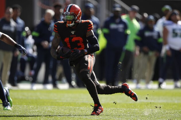 Cleveland Browns wide receiver Odell Beckham (13) runs the ball after a catch against the Seattle Seahawks during an NFL football game, Sunday, Oct. 13, 2019, in Cleveland. (Jeff Haynes/AP Images for Panini)