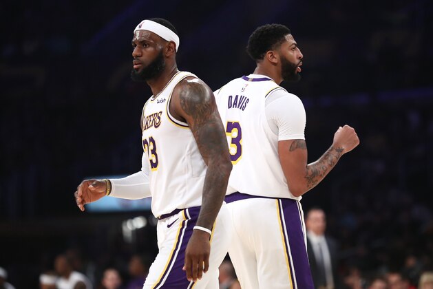 LOS ANGELES, CALIFORNIA - OCTOBER 16:  LeBron James #23 and Anthony Davis #3 of the Los Angeles Lakers look on during the second half of a game against the Golden State Warriors at Staples Center on October 16, 2019 in Los Angeles, California. (Photo by Sean M. Haffey/Getty Images)