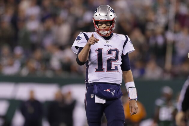 New England Patriots quarterback Tom Brady (12) points to Benjamin Watson (84) after a play during the first half of an NFL football game against the New York Jets, Monday, Oct. 21, 2019, in East Rutherford, N.J. (AP Photo/Adam Hunger)