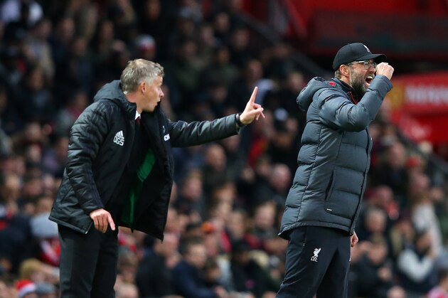 MANCHESTER, ENGLAND - OCTOBER 20:  Ole Gunnar Solskjaer, Manager of Manchester United and Jurgen Klopp, Manager of Liverpool gives their side instructions during the Premier League match between Manchester United and Liverpool FC at Old Trafford on October 20, 2019 in Manchester, United Kingdom. (Photo by Alex Livesey/Getty Images)