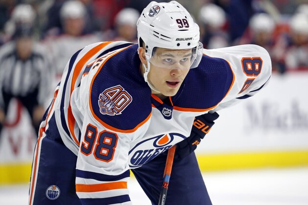Edmonton Oilers' Jesse Puljujarvi (98) waits for a face-off against the Carolina Hurricanes during the second period of an NHL hockey game, Friday, Feb. 15, 2019, in Raleigh, N.C. (AP Photo/Karl B DeBlaker)