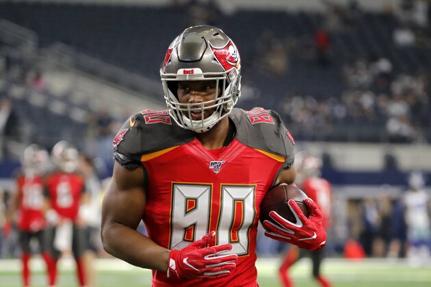 Tampa Bay Buccaneers tight end O.J. Howard (80) warms up before a preseason NFL football game against the Dallas Cowboys in Arlington, Texas, Thursday, Aug. 29, 2019. (AP Photo/Tony Gutierrez) Tampa Bay Buccaneers tight end O.J. Howard (80) warms up before a preseason NFL football game against the Dallas Cowboys in Arlington, Texas, Thursday, Aug. 29, 2019. (AP Photo/Tony Gutierrez)