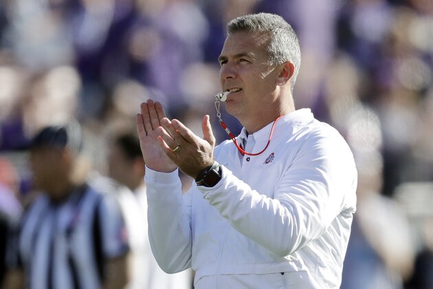 Ohio State head coach Urban Meyer watches during warm ups before the Rose Bowl NCAA college football game against Washington, Tuesday, Jan. 1, 2019, in Pasadena, Calif. (AP Photo/Marcio Jose Sanchez)