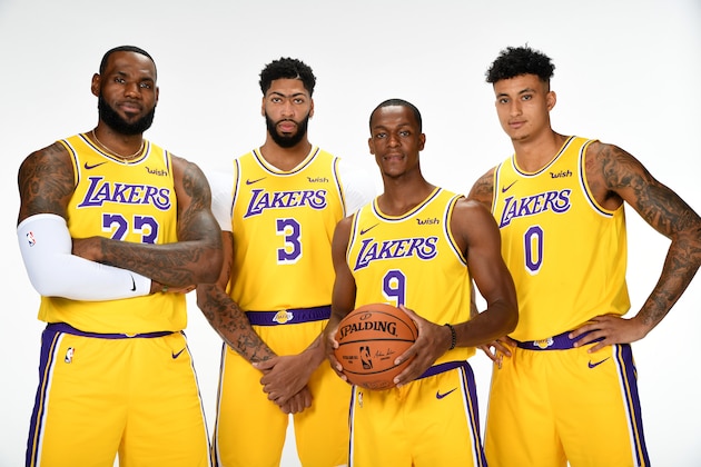 EL SEGUNDO, CA - SEPTEMBER 27: LeBron James #23, Anthony Davis #3, Rajon Rondo #9, and Kyle Kuzma #0 of the Los Angeles Lakers pose for a portrait during media day on September 27, 2019 at the UCLA Health Training Center in El Segundo, California. NOTE TO USER: User expressly acknowledges and agrees that, by downloading and/or using this photograph, user is consenting to the terms and conditions of the Getty Images License Agreement. Mandatory Copyright Notice: Copyright 2019 NBAE (Photo by Andrew D. Bernstein/NBAE via Getty Images)