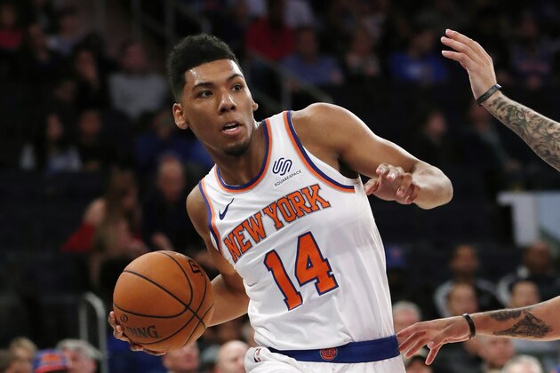New York Knicks guard Allonzo Trier (14) looks to pass during the second half of a preseason NBA basketball game against the Washington Wizards in New York, Friday, Oct. 11, 2019. (AP Photo/Kathy Willens)