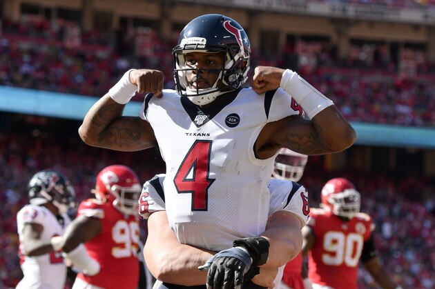 Houston Texans quarterback Deshaun Watson (4) celebrates his touchdown against the Kansas City Chiefs during the second half of an NFL football game in Kansas City, Mo., Sunday, Oct. 13, 2019. (AP Photo/Ed Zurga)