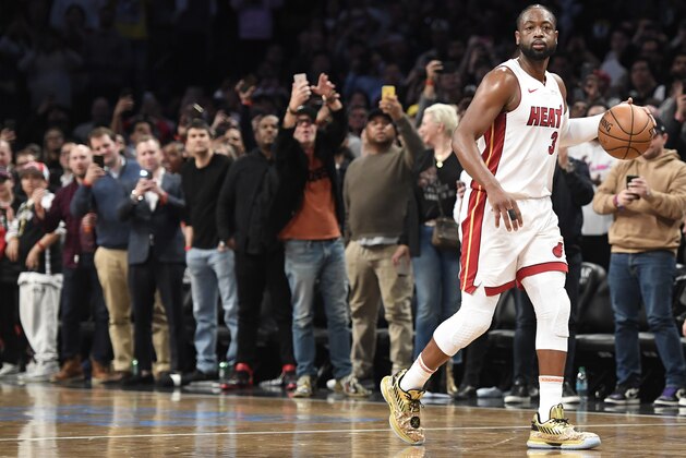 NEW YORK, NEW YORK - APRIL 10: Dwyane Wade #3 of the Miami Heat dribbles the ball in the final seconds of the game against the Brooklyn Nets at Barclays Center on April 10, 2019 in the Brooklyn borough of New York City. This was Wade's last NBA game before retirement. NOTE TO USER: User expressly acknowledges and agrees that, by downloading and or using this photograph, User is consenting to the terms and conditions of the Getty Images License Agreement.(Photo by Sarah Stier/Getty Images)